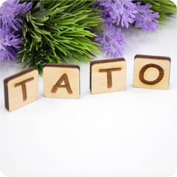 Tato spelling out of plywood, Plywood 4 mm.